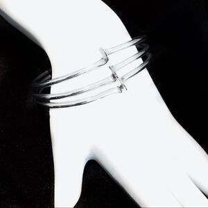 Silver modernist waves bracelet clamp on